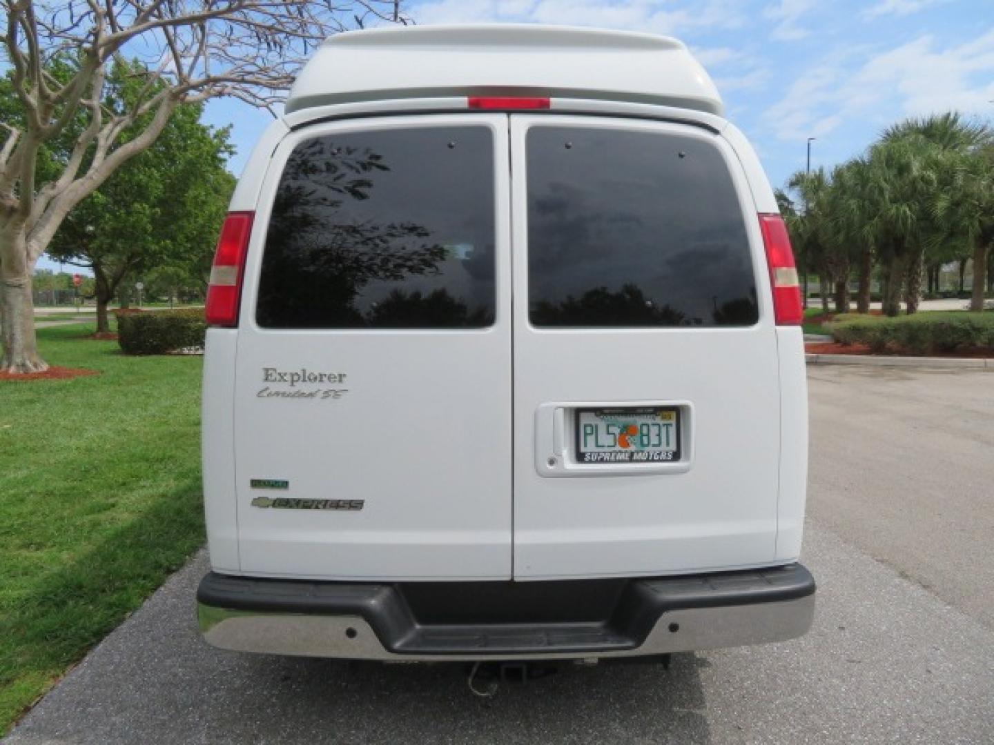 2010 White /Gray Chevrolet Express (1GNUGCD48A1) , located at 4301 Oak Circle #19, Boca Raton, FL, 33431, (954) 561-2499, 26.388861, -80.084038 - You are looking at a Gorgeous 2010 Chevy Express Handicap Wheelchair Conversion Van Explorer Limited SE with 31K Original Miles, Braun Century 750lb Side Entry Wheelchair lift, Tie Down System in the Floor, Rear Entertainment with Flat Screen TV/DVD, Leather Interior, Rear Power Folding Bench Seat/b - Photo#16